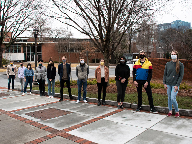 Students on the 2020-2021 SPA Board standing socially distanced outside for their group photo.