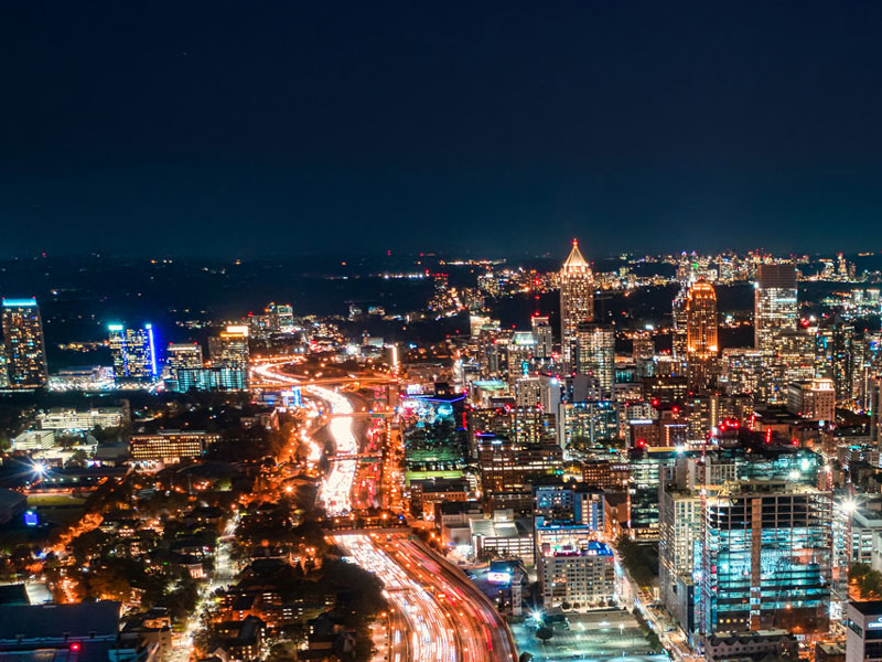 The city of Atlanta lit up at night.